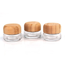 wholesale 20ml clear round facial cream cosmetic packaging glass jar with bamboo wood cap